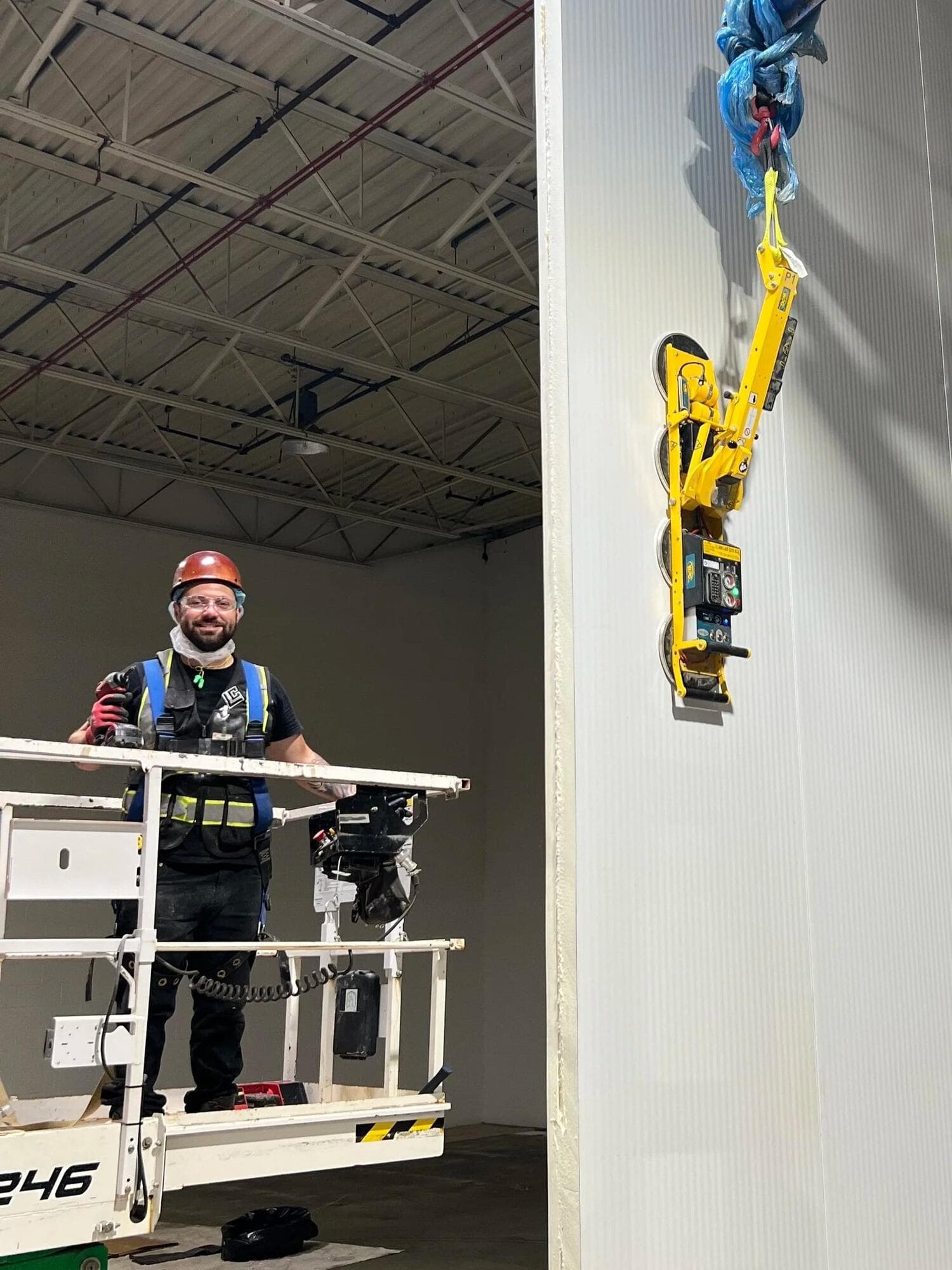 Luke Wetherbee of Lakeview Contracting installing an insulated panel